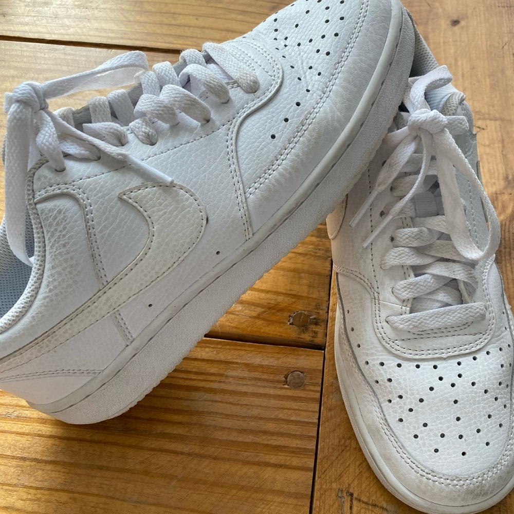 White leather Nike’s.